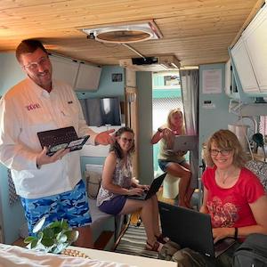 DPF President and Org team in a caravan