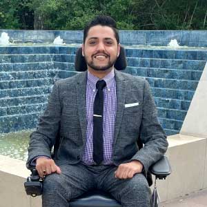 Ali-Zia-Kerawala sat in a wheelchair