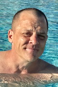 Headshot of Charles Davis in the pool