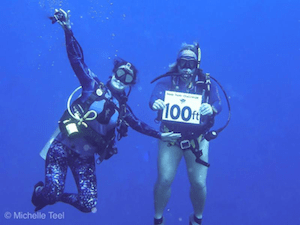 Naught Sister Allison and Kristie with he 100ft sign